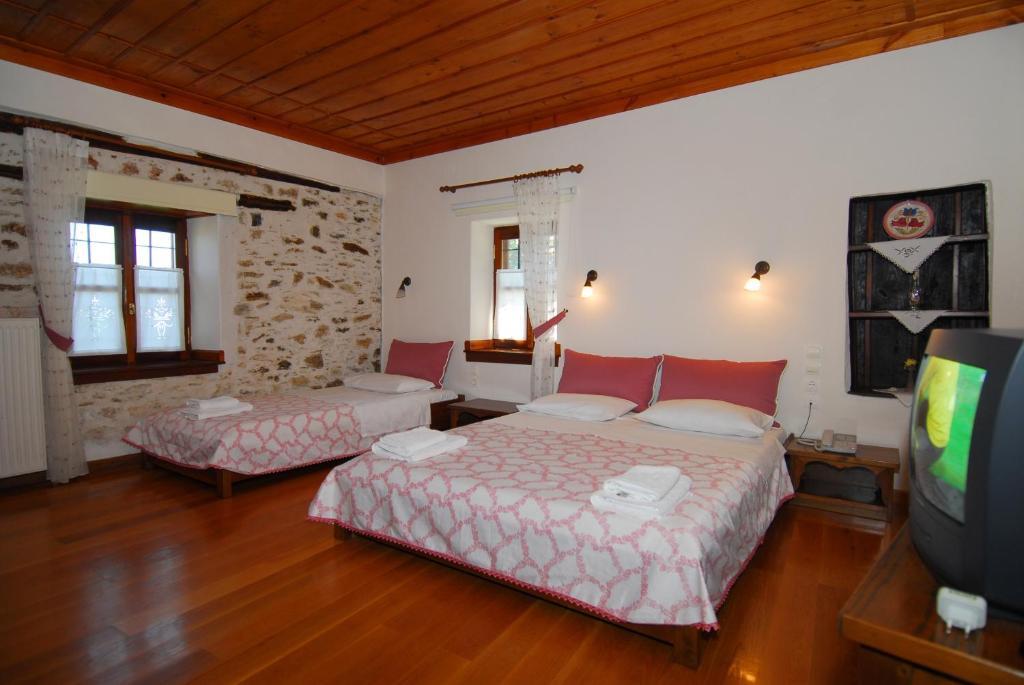 Archontiko Iatridis Hotell Mourésion Rum bild