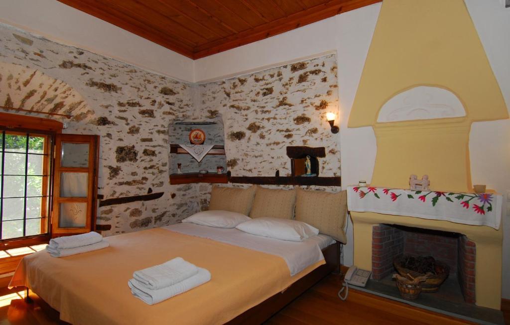 Archontiko Iatridis Hotell Mourésion Rum bild
