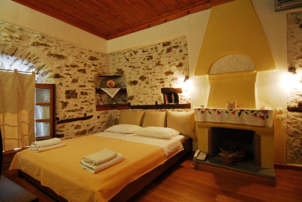 Archontiko Iatridis Hotell Mourésion Rum bild